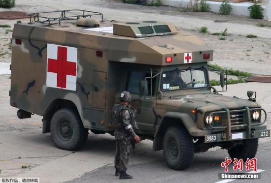 資料圖：當(dāng)?shù)貢r(shí)間2014年6月23日，韓國江原道哨所槍擊事件肇事士兵林某已被抓獲