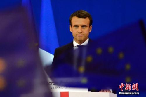 圖為馬克龍?jiān)趹c祝集會上。中新社記者 龍劍武 攝